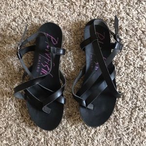 Black strap sandals.